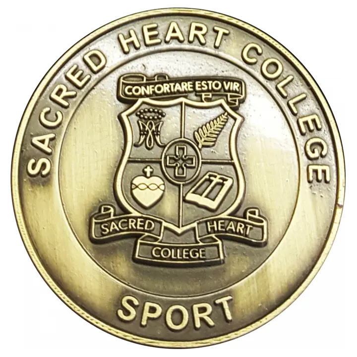 Round commemorative medal with a detailed centre design