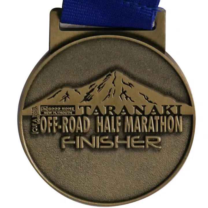 Custom running medal with a map-style centre and a printed neck ribbon